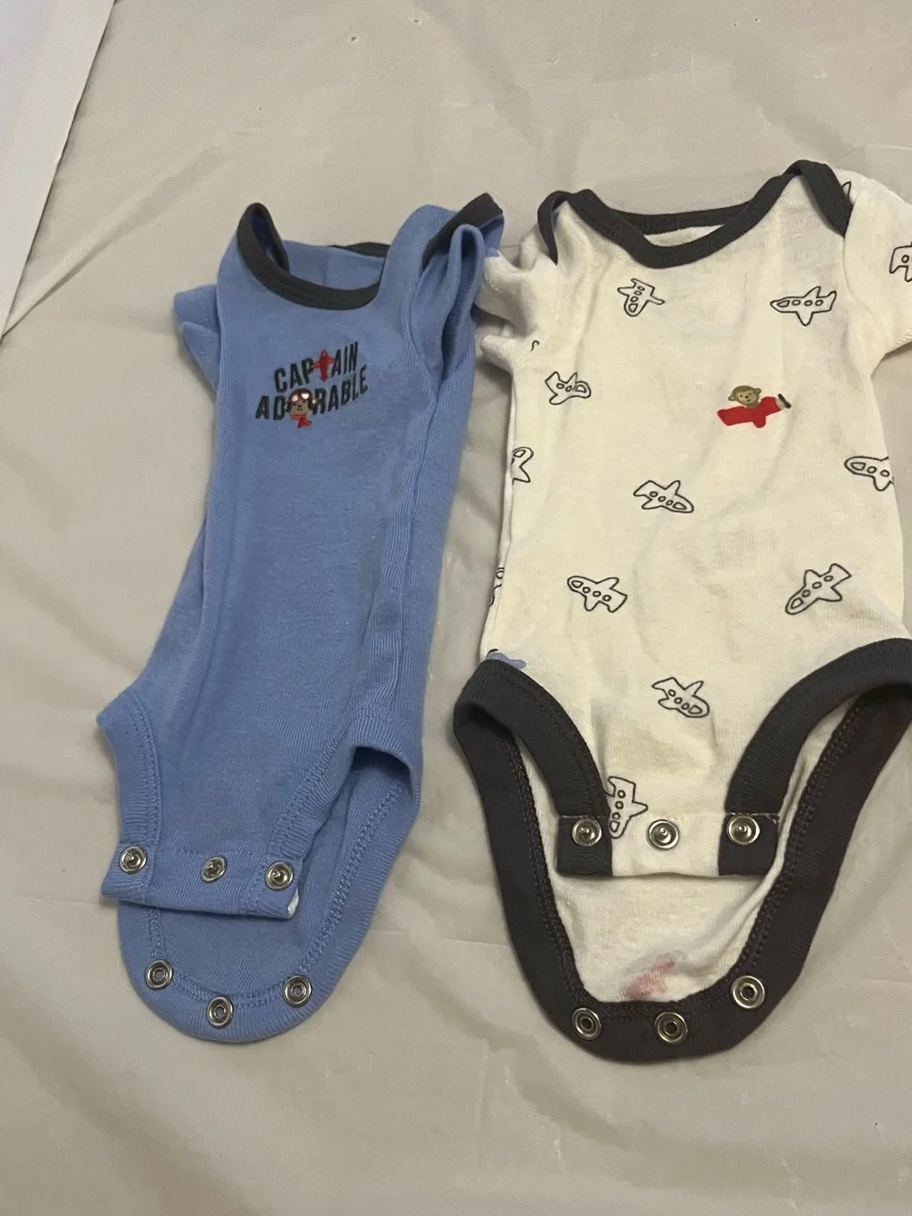 2 premie onesies carters